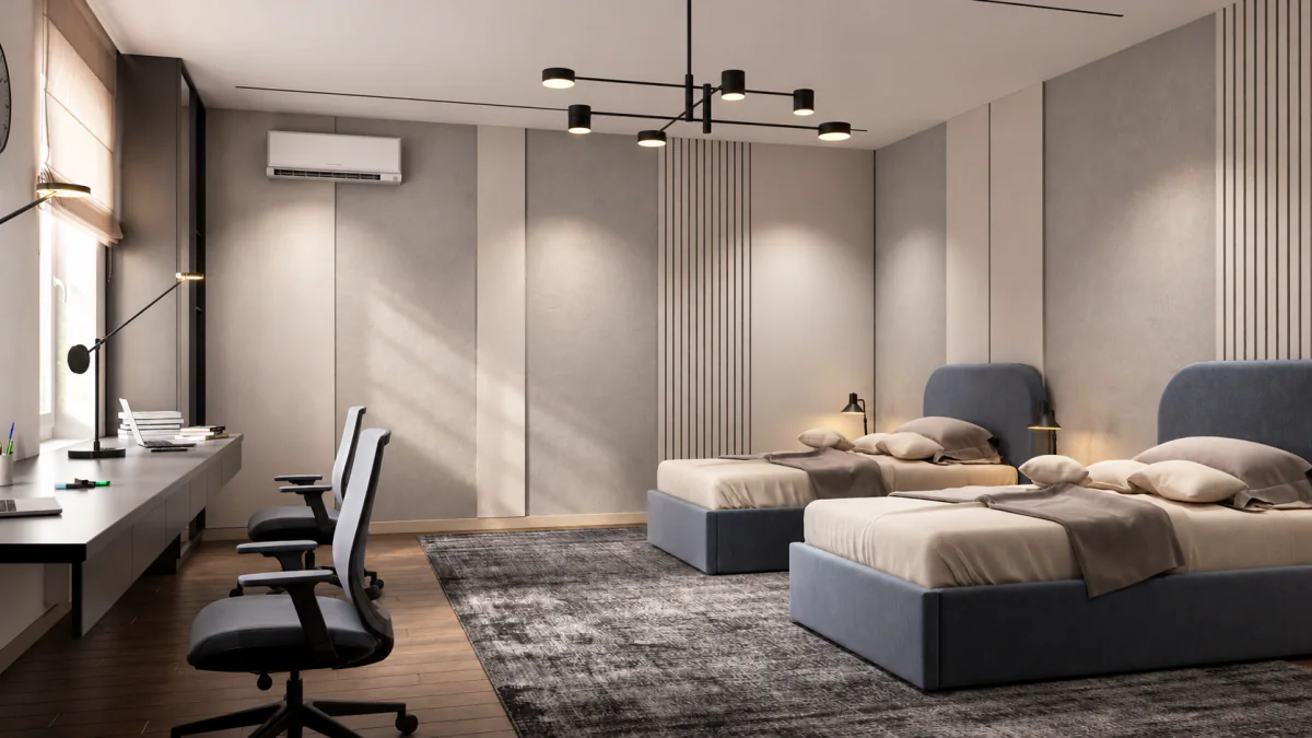 Shared bedroom with two beds and a study area by the windows